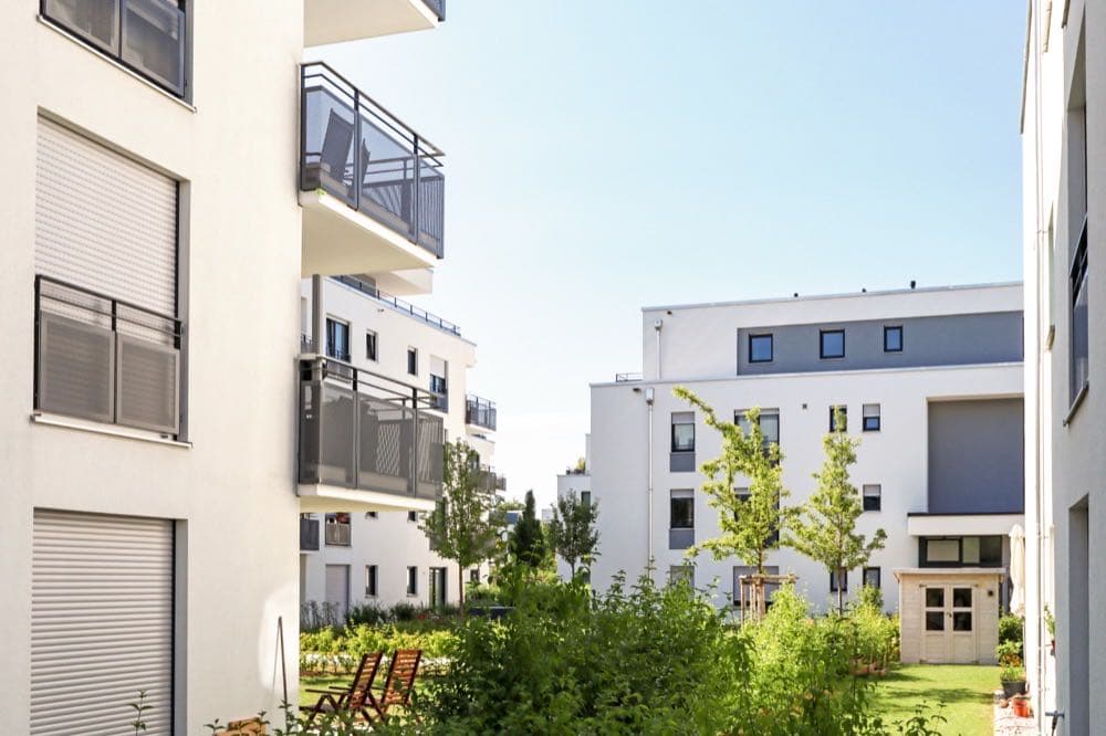 Residential apartment buildings representing affordable housing developments