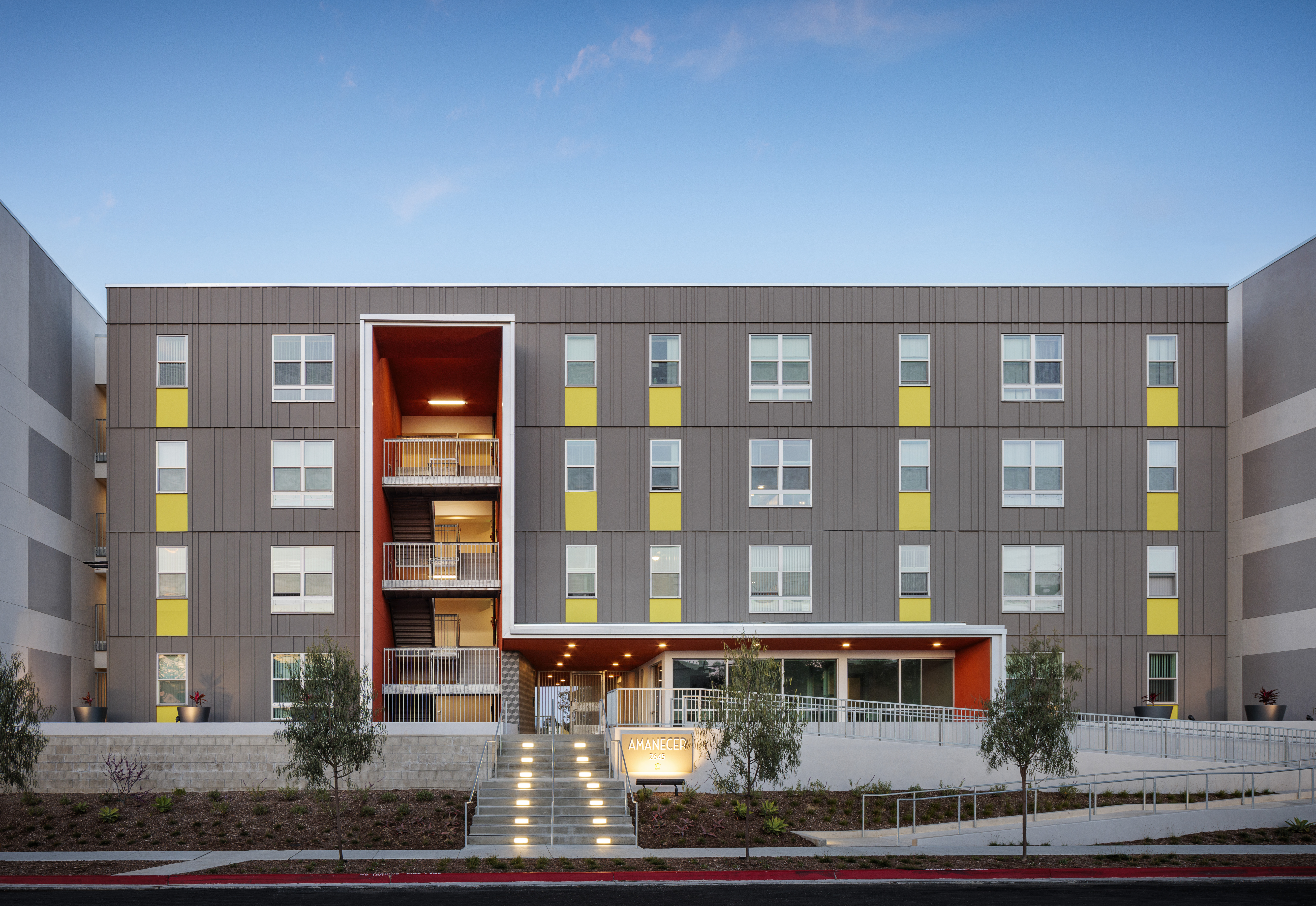Amanecer Apartments building and community